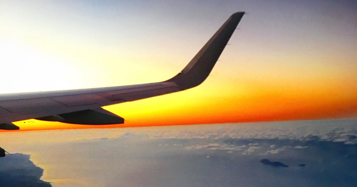 Airplane wing sunrise